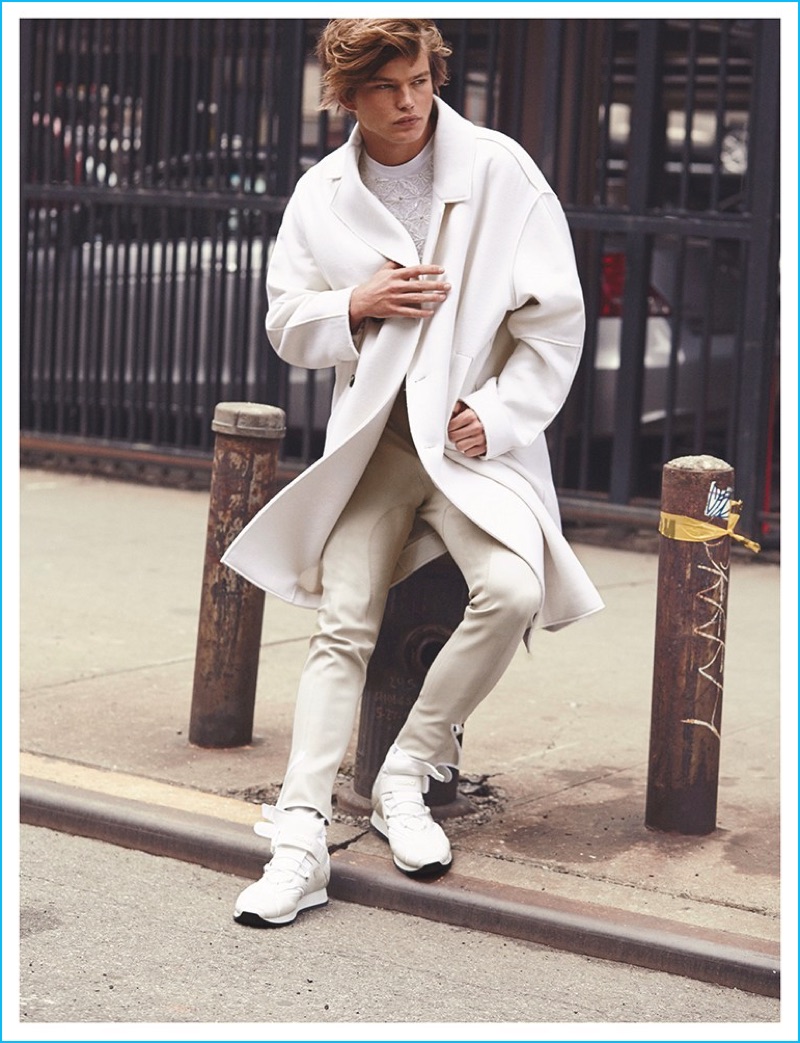 Jordan Barrett embraces monochromatic styling in a look from Versace for the pages of Narcisse magazine.