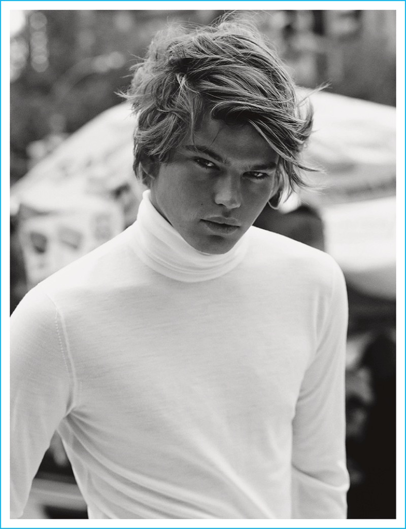 Jordan Barrett is ready for his close-up in a white Versace turtleneck for Narcisse magazine.