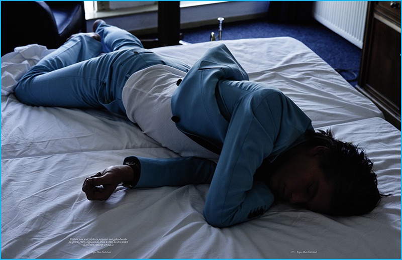 Jordan Barrett captured in a light blue Gucci suit for Vogue Man Netherlands.