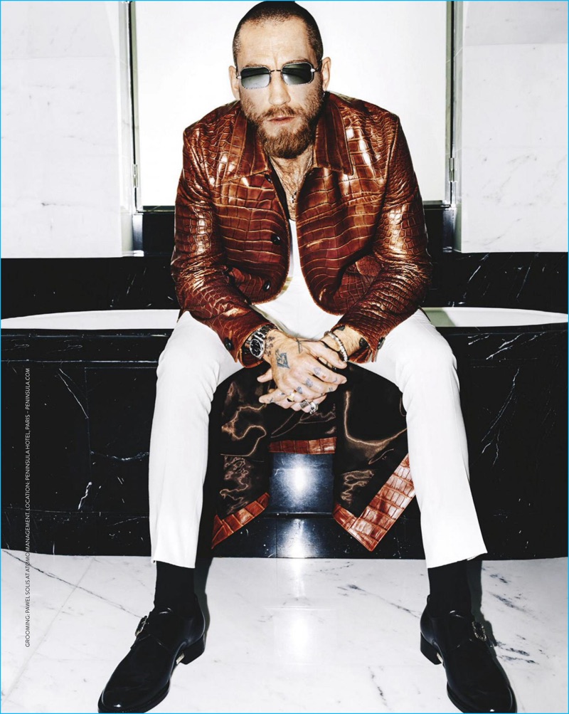 Justin O'Shea rocks a brown leather Brioni jacket for the pages of GQ Australia.