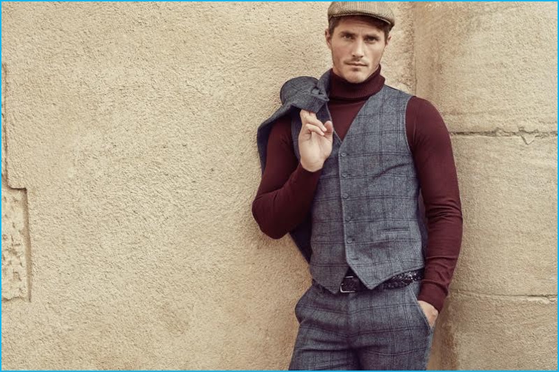 Ollie Edwards dons a check waistcoat and trousers with a turtleneck sweater and newsboy cap for Koton Men's fall-winter 2016 campaign.