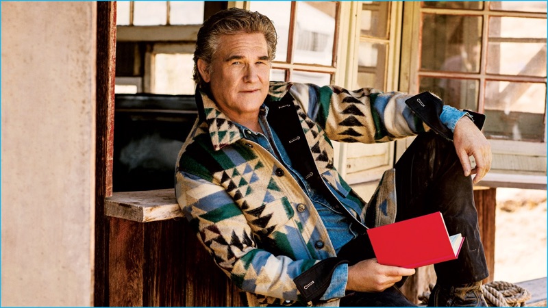 Kurt Russell dons a Valentino jacket with a Levi's denim shirt, Rag & Bone Standard Issue denim jeans, and Corral boots for GQ.