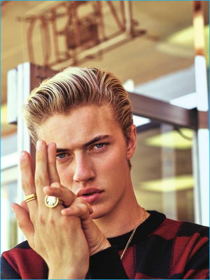 Lucky Blue Smith wears a red and black check sweater from Dior Homme for Zeit magazine.