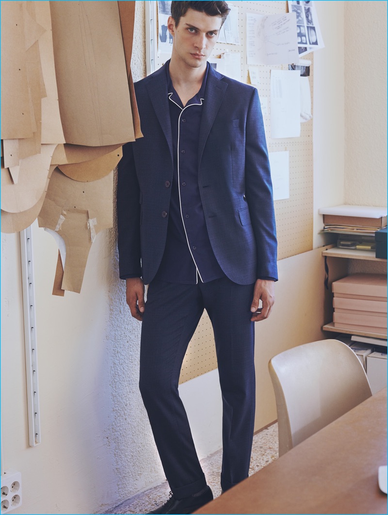 Matthew Bell is front and center in a suit worn with a trendy pajama-inspired top from Mango Man.