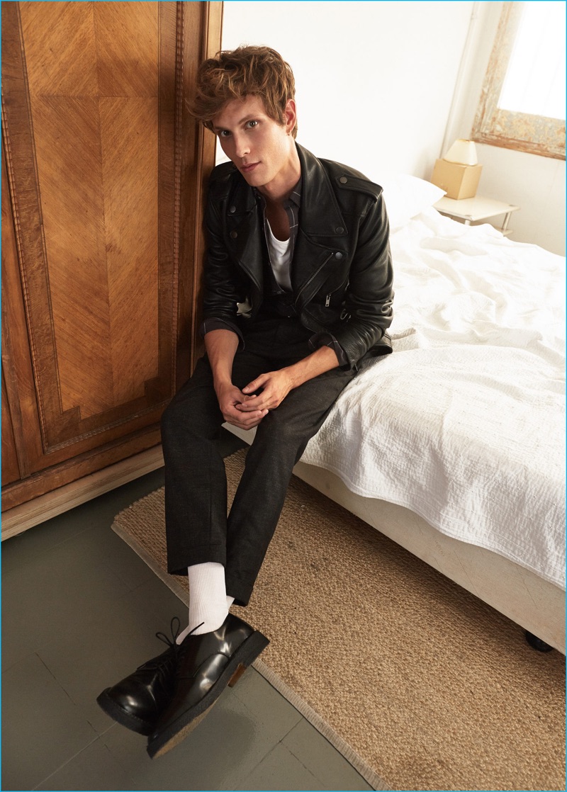 Felix Gesnouin is a cool vision in a leather biker jacket and skinny jeans from Mango Man.