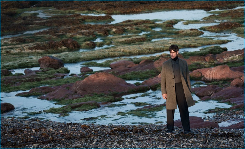 Axel Hermann wears cashmere turtleneck sweater Alexander McQueen, double leather monk strap shoes Valentino, shirt and wool trousers Lemaire.