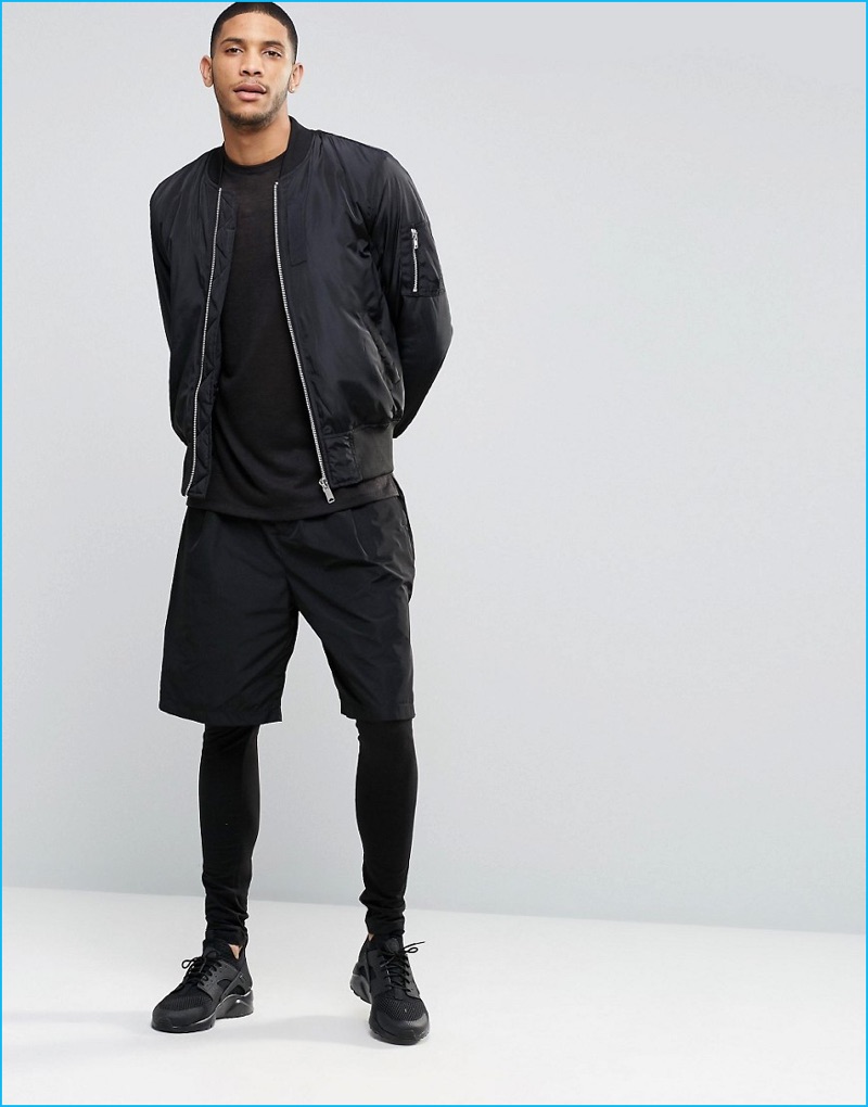 ASOS Black Men's Leggings styled with shorts and a bomber jacket.