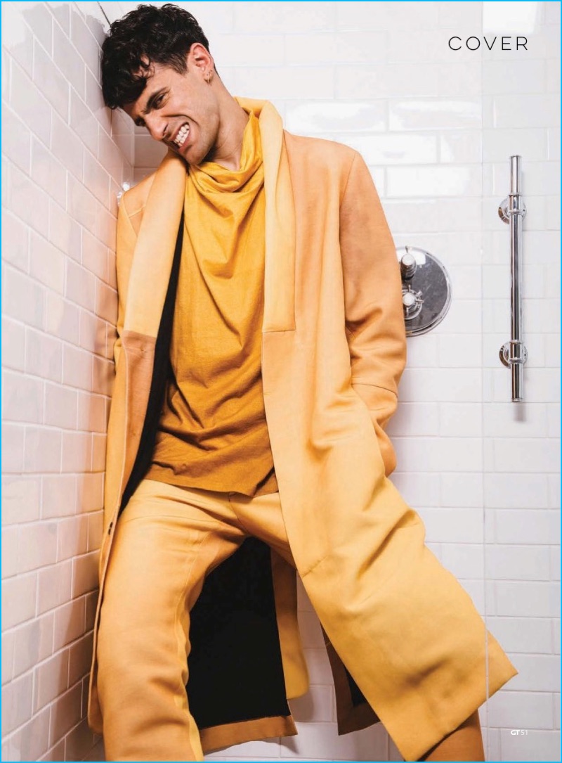 Neil Amin-Smith wears a bold yellow number from Berthold for Gay Times.
