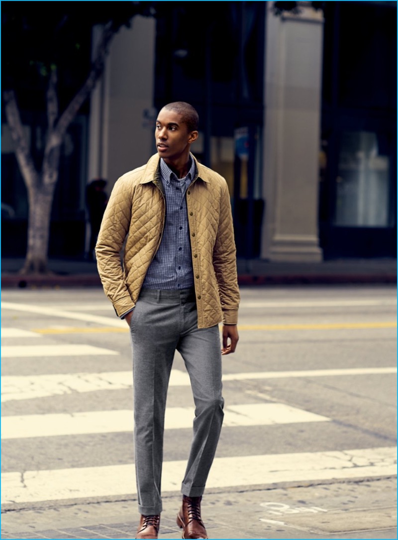 Claudio Monteiro wears grey trousers Bonobos, brown leather boots J&M 1850, check shirt and quilted shirt jacket Billy Reid.