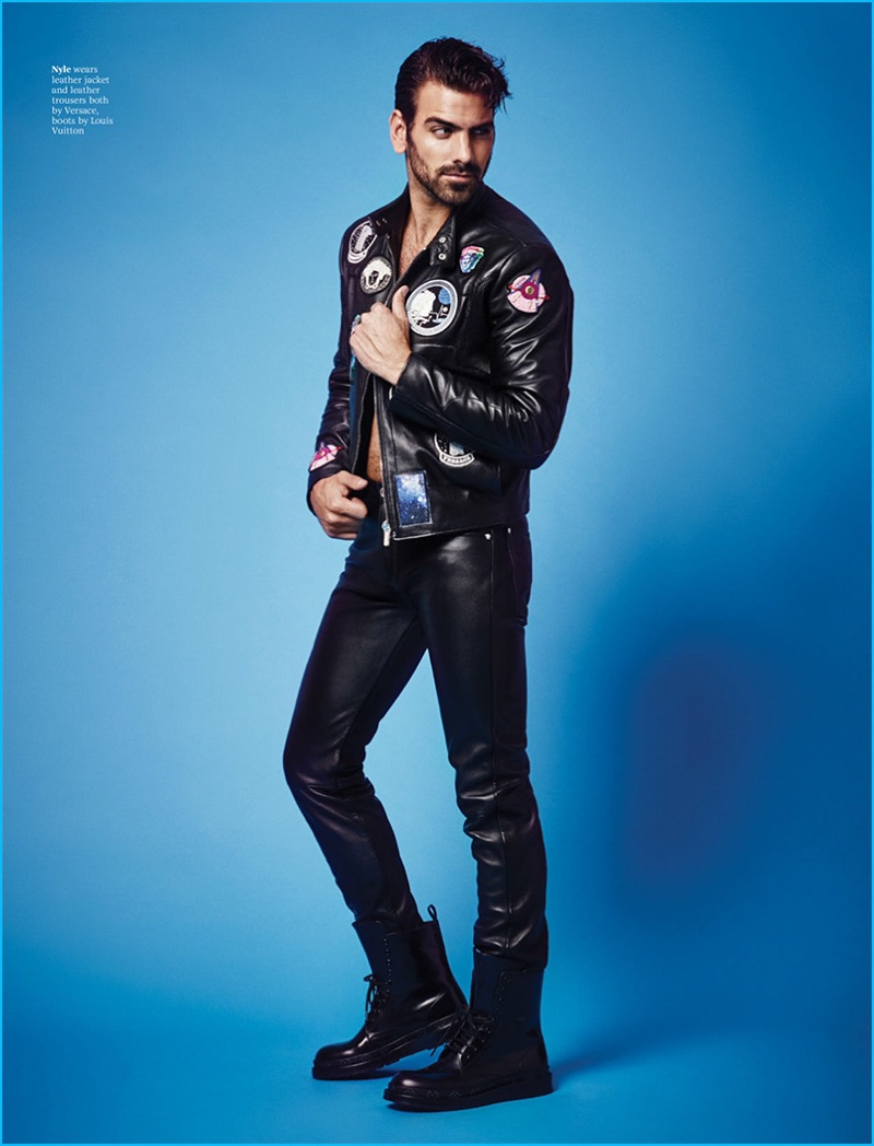 Nyle DiMarco poses in a leather jacket and pants from Versace with Louis Vuitton combat boots for Attitude magazine.