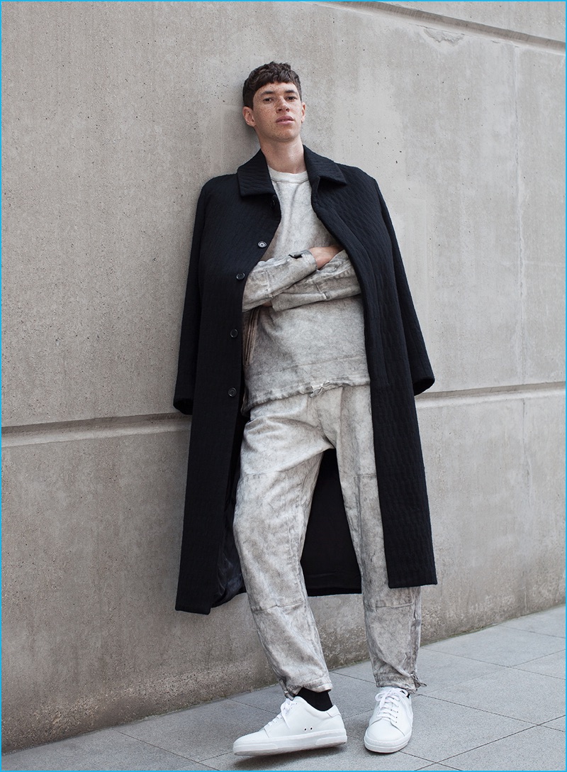 Jos Whiteman wears overcoat Matthew Miller, dust treated sweatshirt and sweatpants Stone Island.