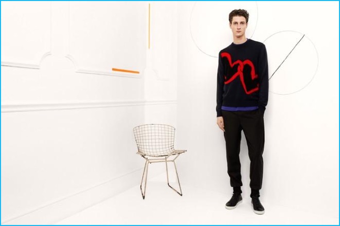 Marc André Turgeon wears a graphic heart sweater from Paul Smith's fall-winter 2016 collection.