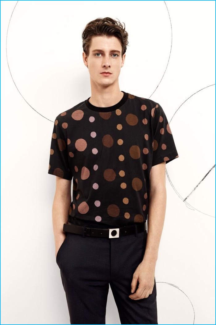 Marc André Turgeon wears a retro-inspired circle print t-shirt from Paul Smith's fall-winter 2016 collection.