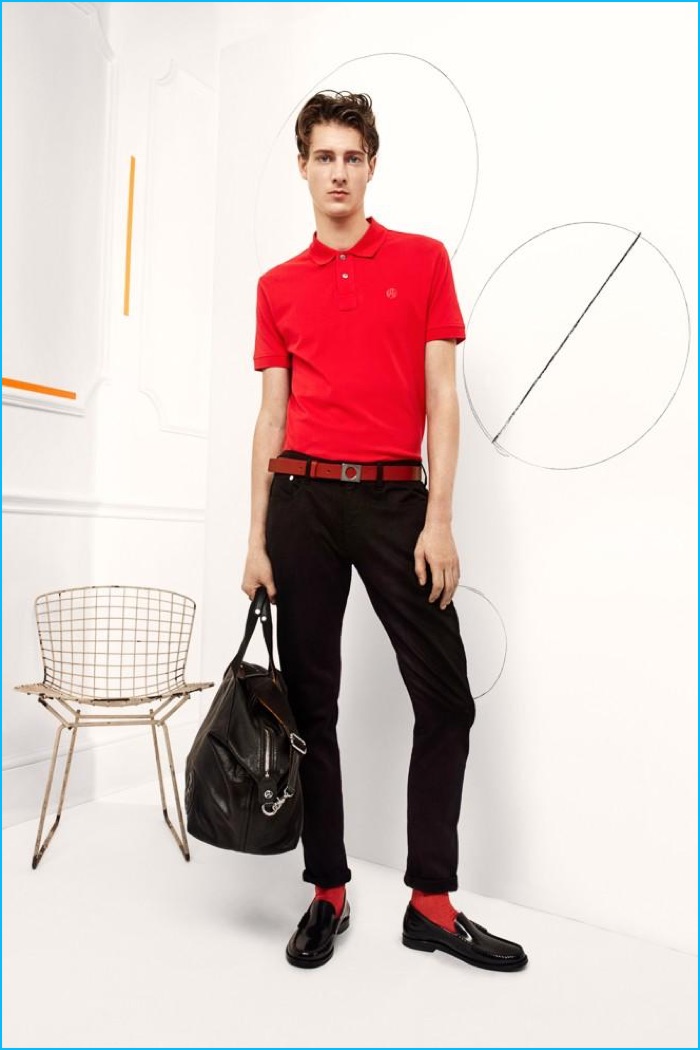 Marc André Turgeon wears a red polo shirt with slim black trousers from Paul Smith's fall-winter 2016 collection.