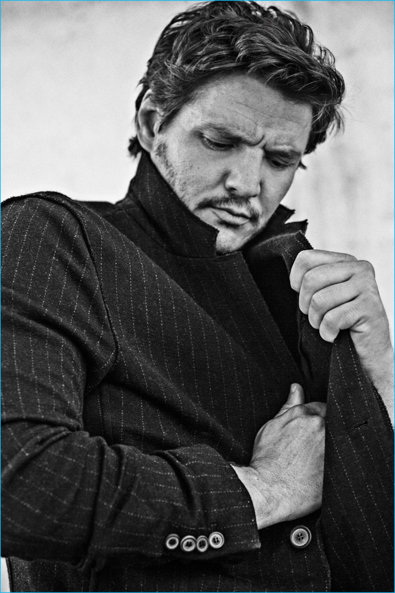 Pedro Pascal dons a pinstripe Lanvin jacket for his So It Goes photo shoot.