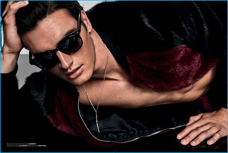 Matthew Terry rocks a fur bomber jacket from Burberry with Tom Ford sunglasses and a Luis Morais white gold necklace.