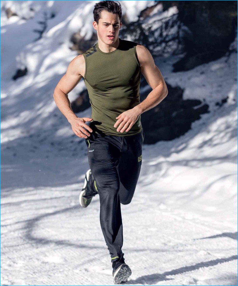 Wearing an EA7 muscle tank, Pietro Boselli enjoys a run.