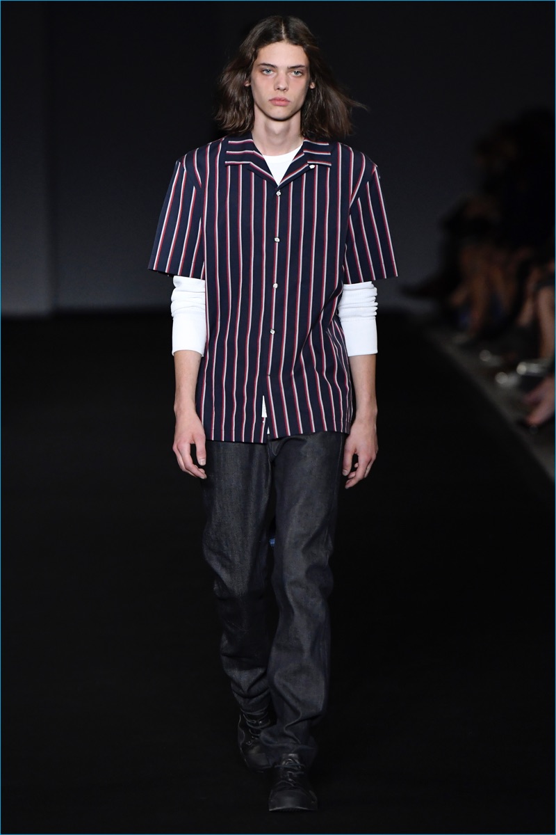 Bringing to mind 90s style, Rag & Bone turns out a boxy striped short sleeve shirt that is layered for spring-summer 2017.