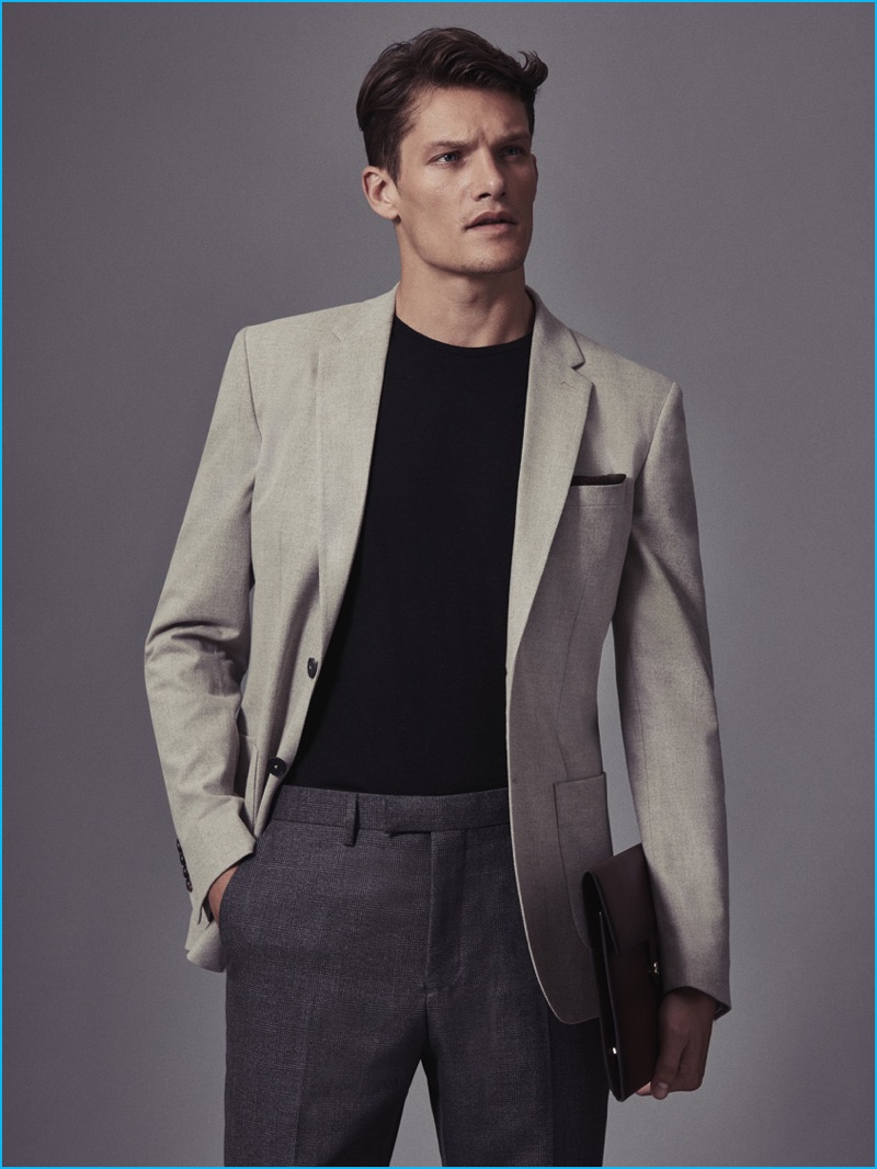 Danny Beauchamp embraces smart tailored separates and a clean t-shirt for a relaxed work style proposal from Reiss.
