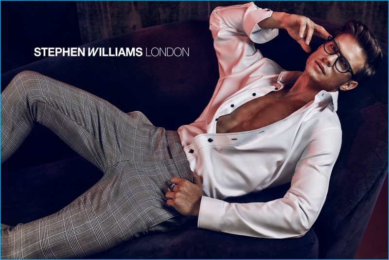 Robert Reider pictured in a white dress shirt and checked trousers for Stephen Williams London's fall-winter 2016 campaign.
