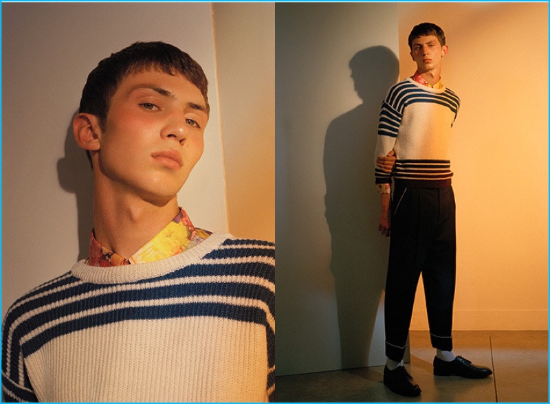 Knitwear gets kitsch with a fitted and striped variety from Belgian designer Raf Simons. The wool sweater is styled with a Comme des Garçons floral print shirt, Gucci pajama trousers, and Paul Smith leather dress shoes.