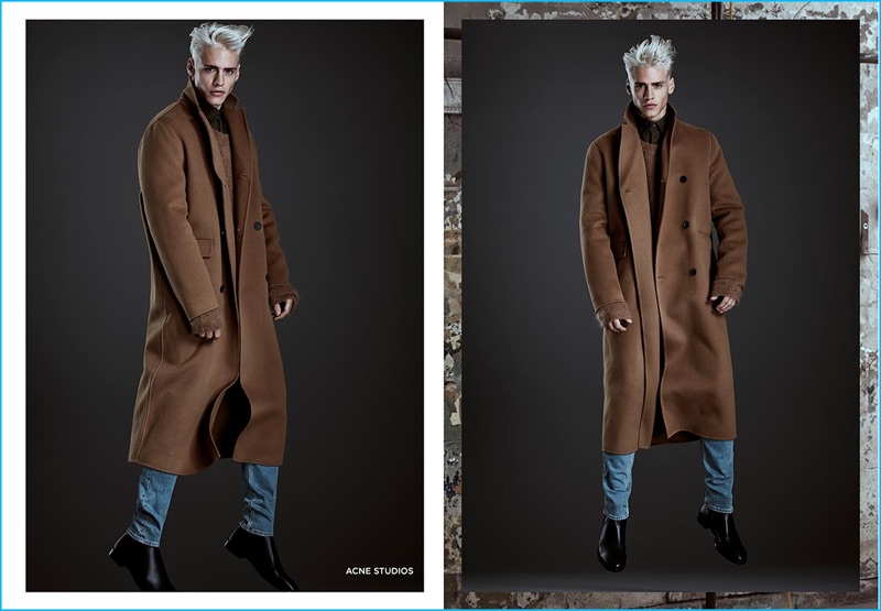 Oliver Stummvoll models an oversized, long brown coat and denim jeans from Acne Studios for Simons' fall-winter 2016 collections lookbook.