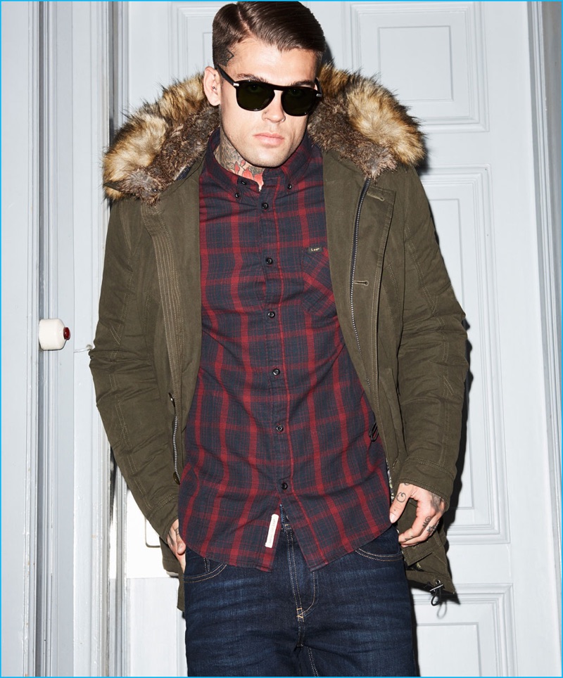 Stephen James is a cool vision in an Autark parka with a Lee plaid button-down shirt for Theo Wormland's fall-winter 2016 campaign.