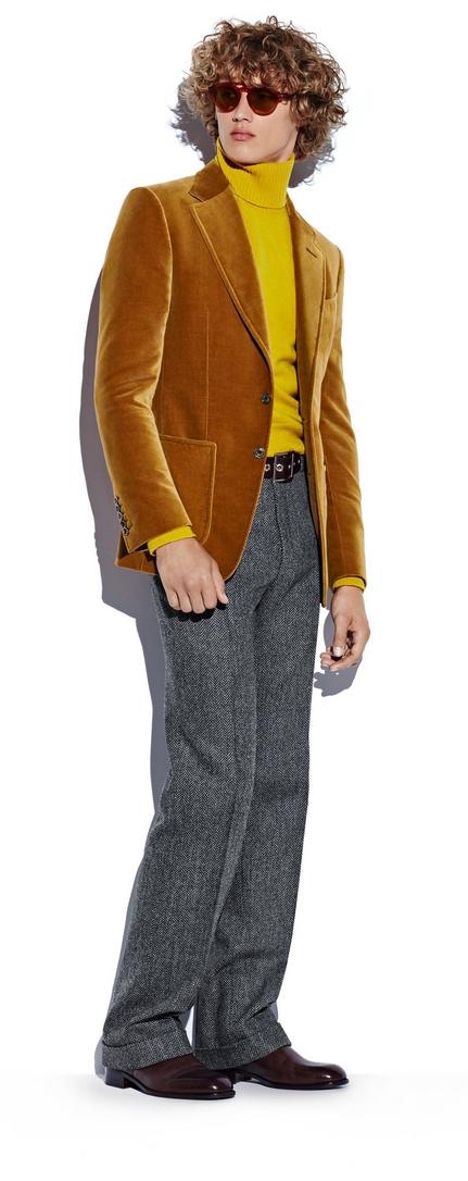 Bram Valbracht models a beige velvet sport jacket with a yellow cashmere turtleneck sweater and soft tweed trousers from Tom Ford's fall-winter 2016 men's collection.
