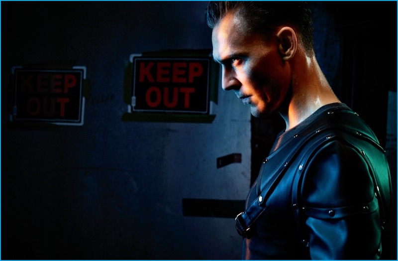 Tom Hiddleston sports a Comme des Garçons Homme Plus leather harness with an AG Jeans t-shirt for Interview magazine.
