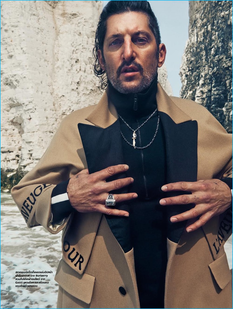 Tony Ward models a dandy fall coat from Italian fashion house Gucci.