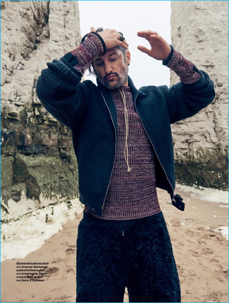 Tony Ward rocks a Vivienne Westwood knit with an Ermenegildo Zegna top and textured pants from Dolce & Gabbana's western themed fall-winter 2016 collection.