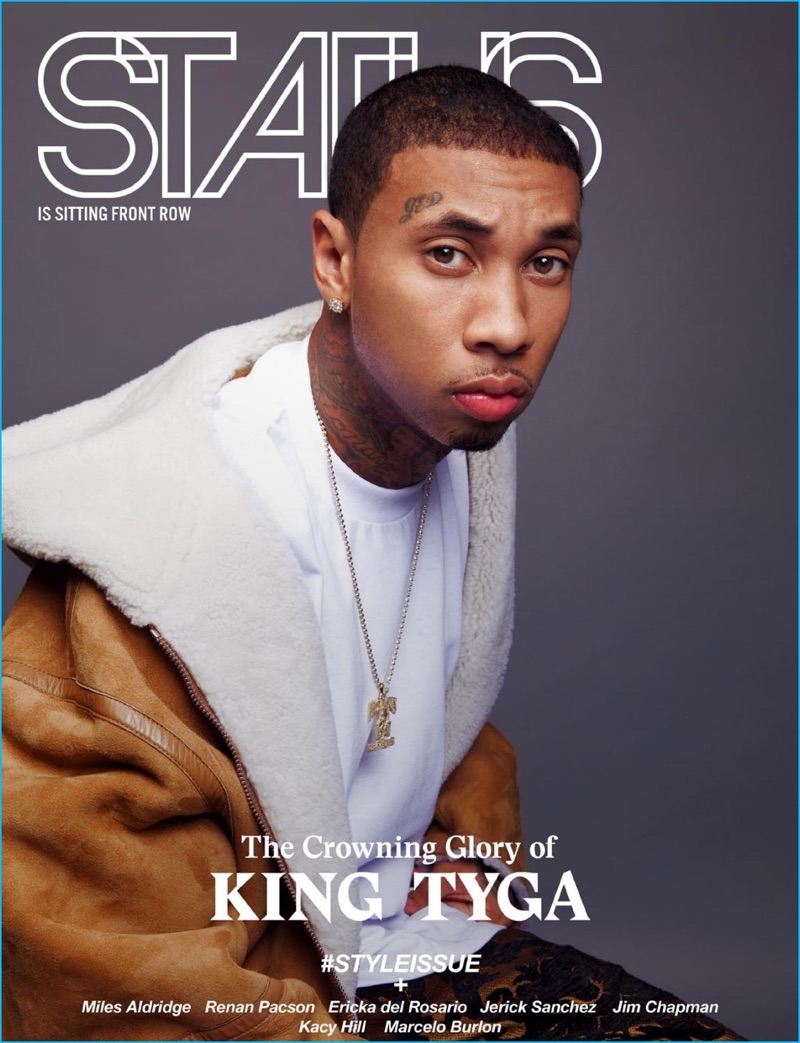 Tyga covers the latest issue of Status magazine in a shearling Alexander Wang jacket.
