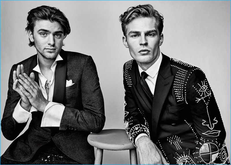 Left to Right: Cole James wears trousers Burberry, jacket, shirt, and pocket square Canali. Taylor Ashmore wears all clothes Valentino and tie Title of Work.