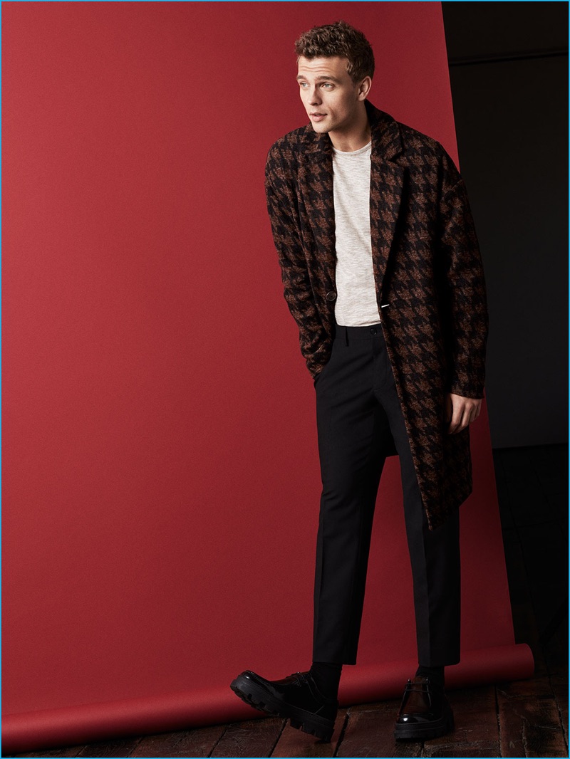 Benjamin Eidem dons a brown and black houndstooth coat inspired by 1984 Chicago for Zara Man's fall-winter 2016 Seasonals collection.
