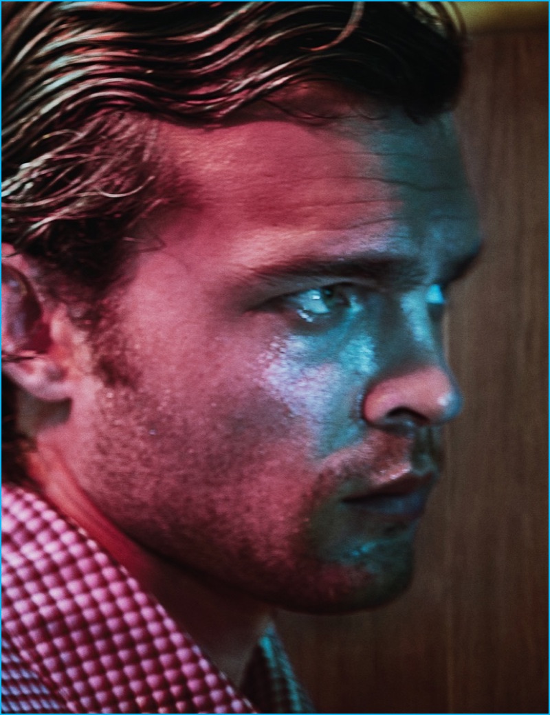 Alden Ehrenreich dons a Prada coat for the pages of Interview magazine.