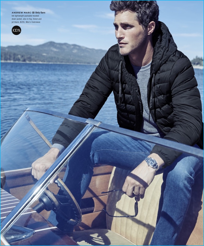 Heading outdoors, Ollie Edwards wears an Andrew Marc hooded down jacket for Bloomingdale's.