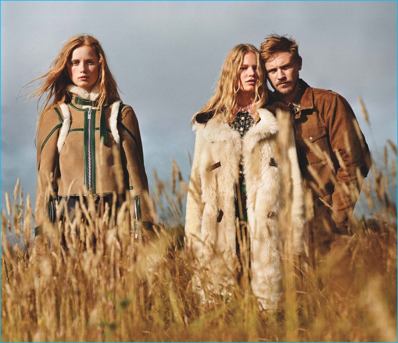 Wearing a Carhartt jacket, Boyd Holbrook joins models Rianne Von Rompaey and Anna Ewers for a Vogue spread.