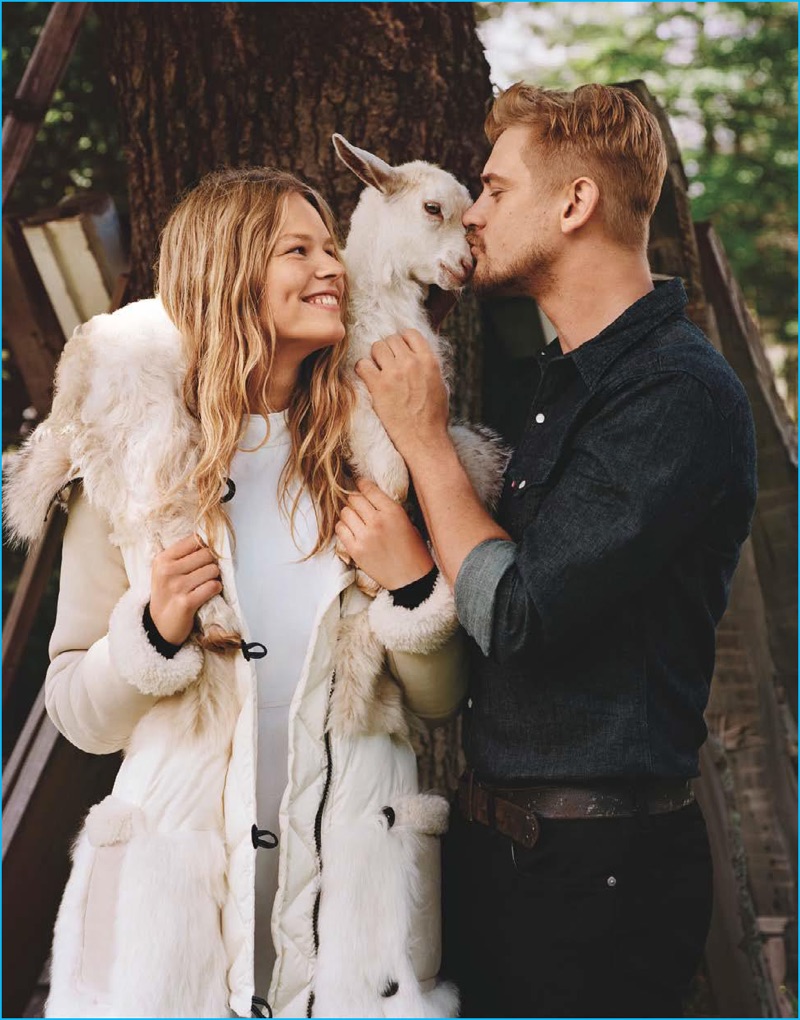 Modeling a Levi's shirt with Denim & Supply Ralph Lauren denim jeans, Boyd Holbrook lays a smooch on a goat for Vogue.