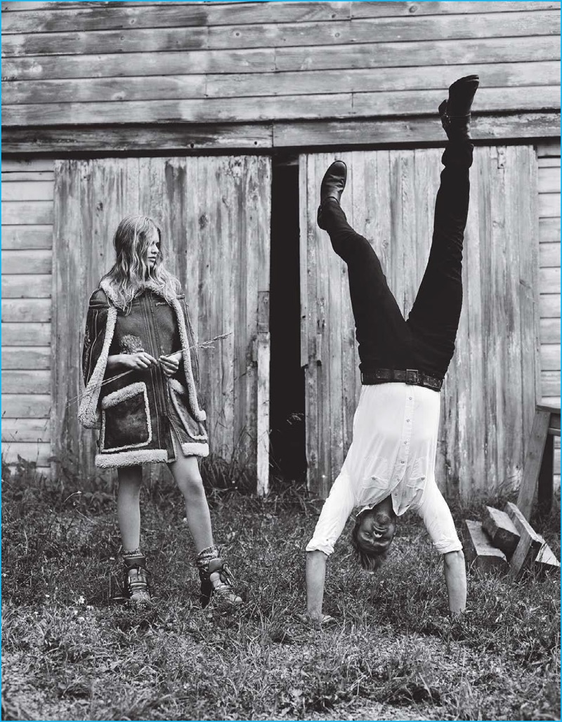 Pictured in a Stetson shirt with Levi's jeans and Frye boots, Boyd Holbrook masters a handstand for Vogue.