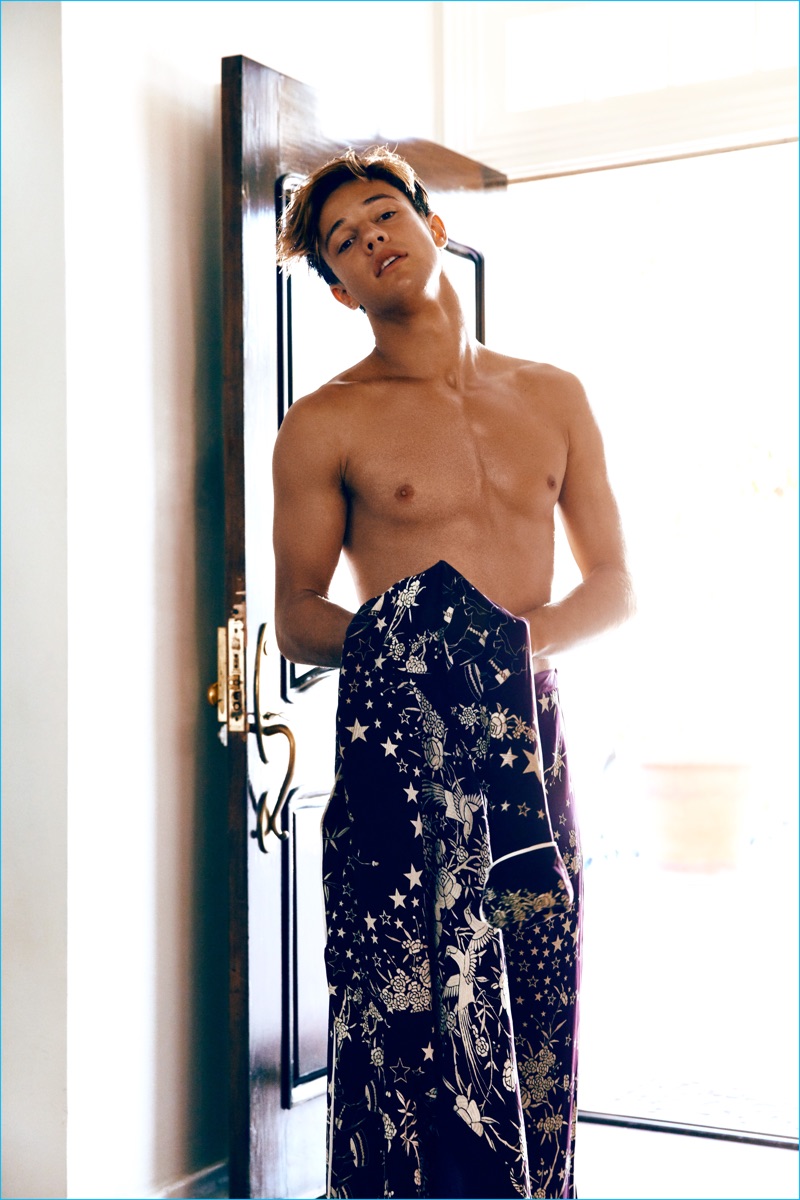 Cameron Dallas goes shirtless in Roberto Cavalli for the pages of Flaunt.