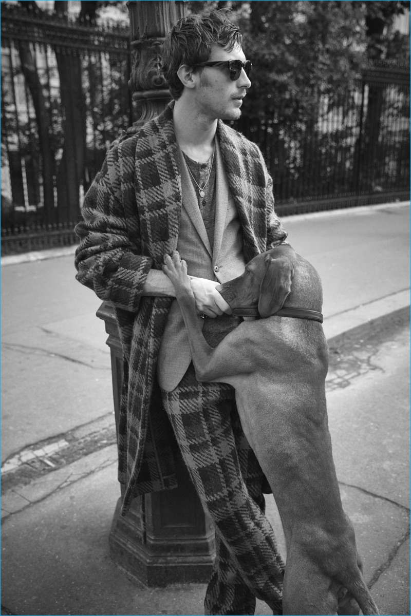 Nicholas Galletti styles Clément Chabernaud in an oversized plaid number from Italian label Fendi.