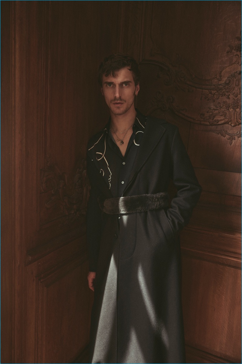 French model Clément Chabernaud wears a coat from Louis Vuitton for the pages of SKP magazine.