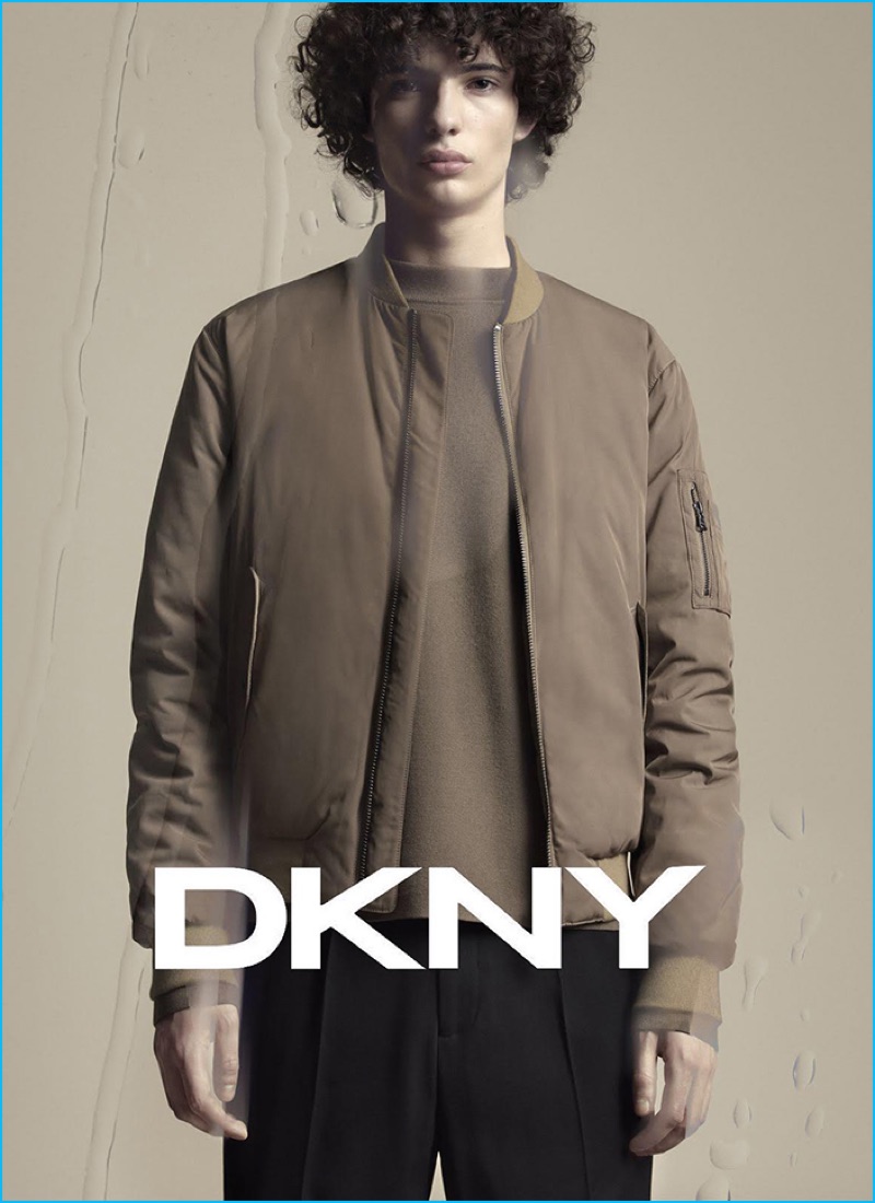Piero Mendez sports a neutral bomber jacket for DKNY's fall-winter 2016 campaign.