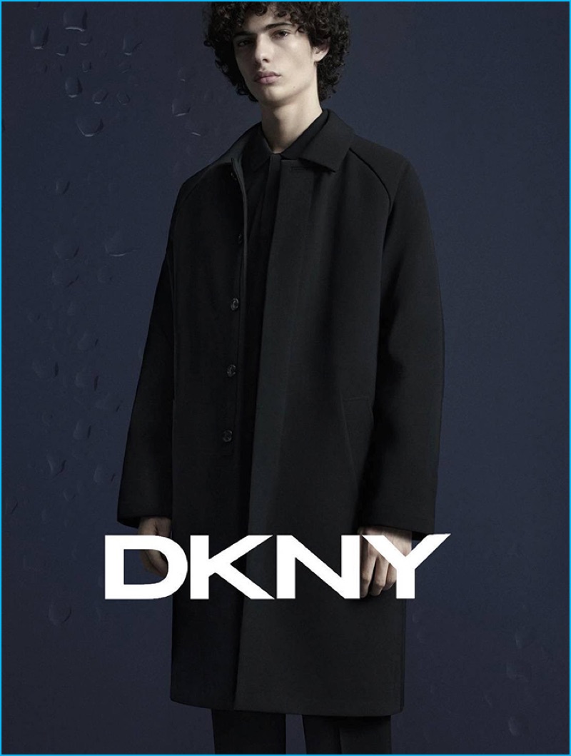 Tom Van Dorpe outfits Piero Mendez in a dark number for DKNY's fall-winter 2016 campaign.