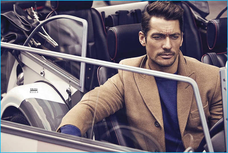 David Gandy dons a blue sweater from Paul Smith with a Hackett London camel coat for GQ México.