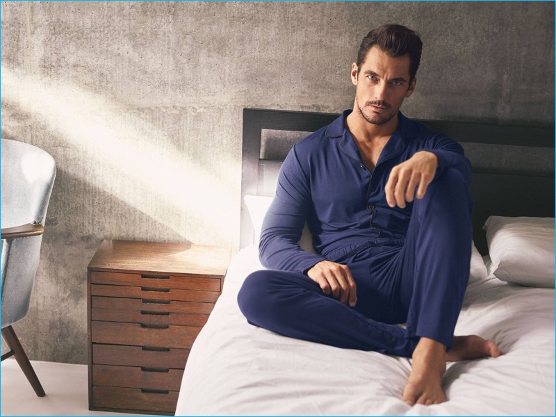 Relaxing in bed, David Gandy models casual staples from his Autograph range at Marks & Spencer.