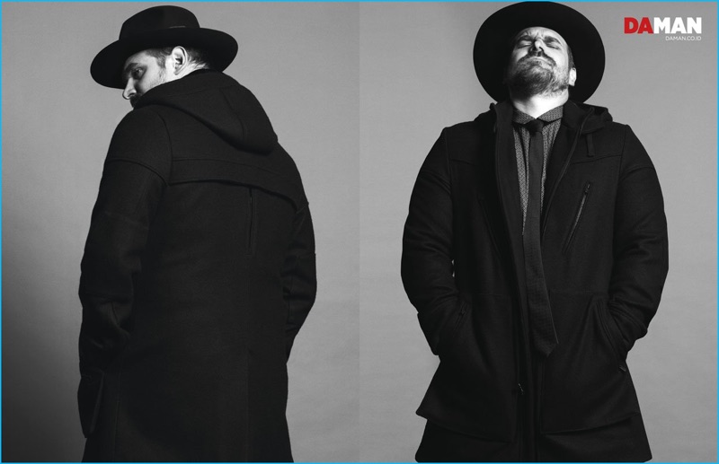 David Harbour wears a coat, shirt and tie from Robert James with a Worth & Worth hat.