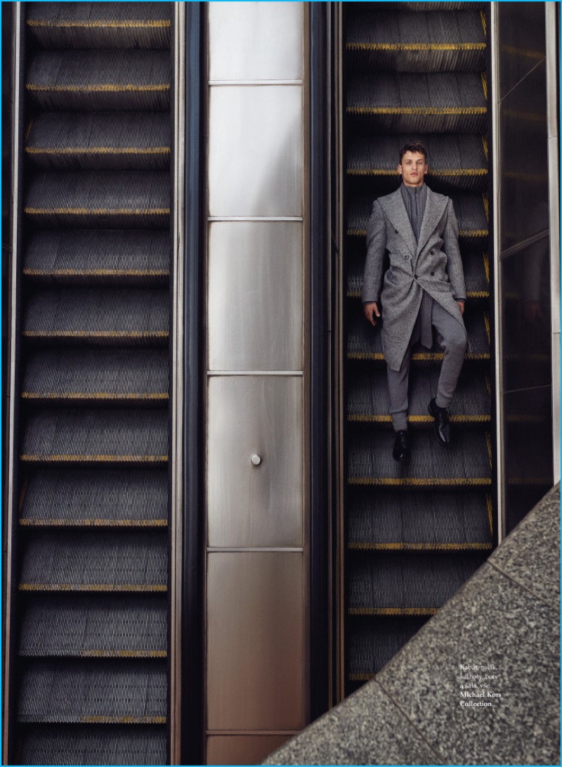 Taking a ride down the escalator, David Trulik dons fall-winter 2016 tailoring from Michael Kors.