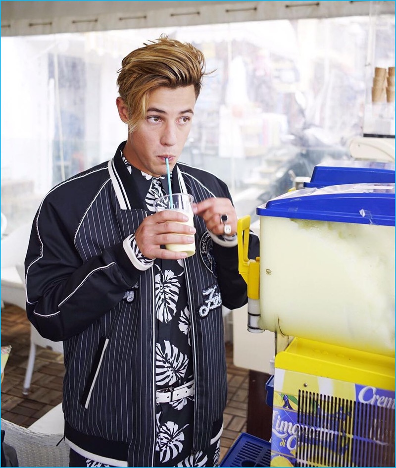 Cameron Dallas enjoys a granita behind the scenes of Dolce & Gabbana's spring-summer 2017 campaign.