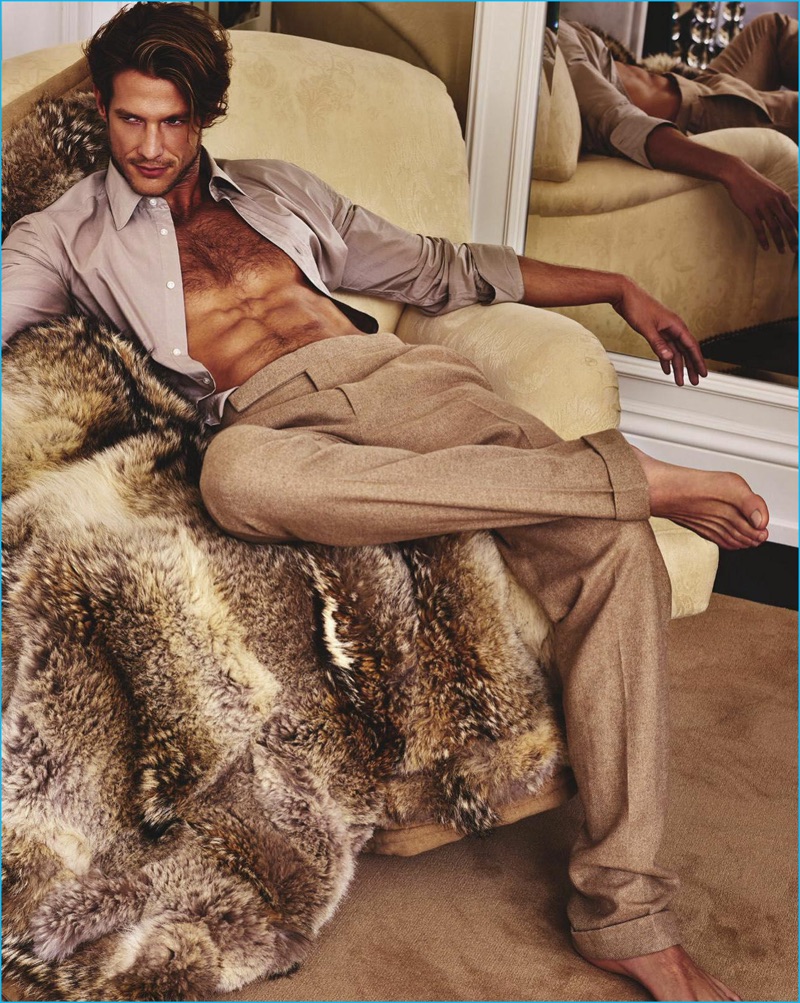 Starring in an editorial for GQ Australia, Domenique Melchior wears Ralph Lauren Purple Label.